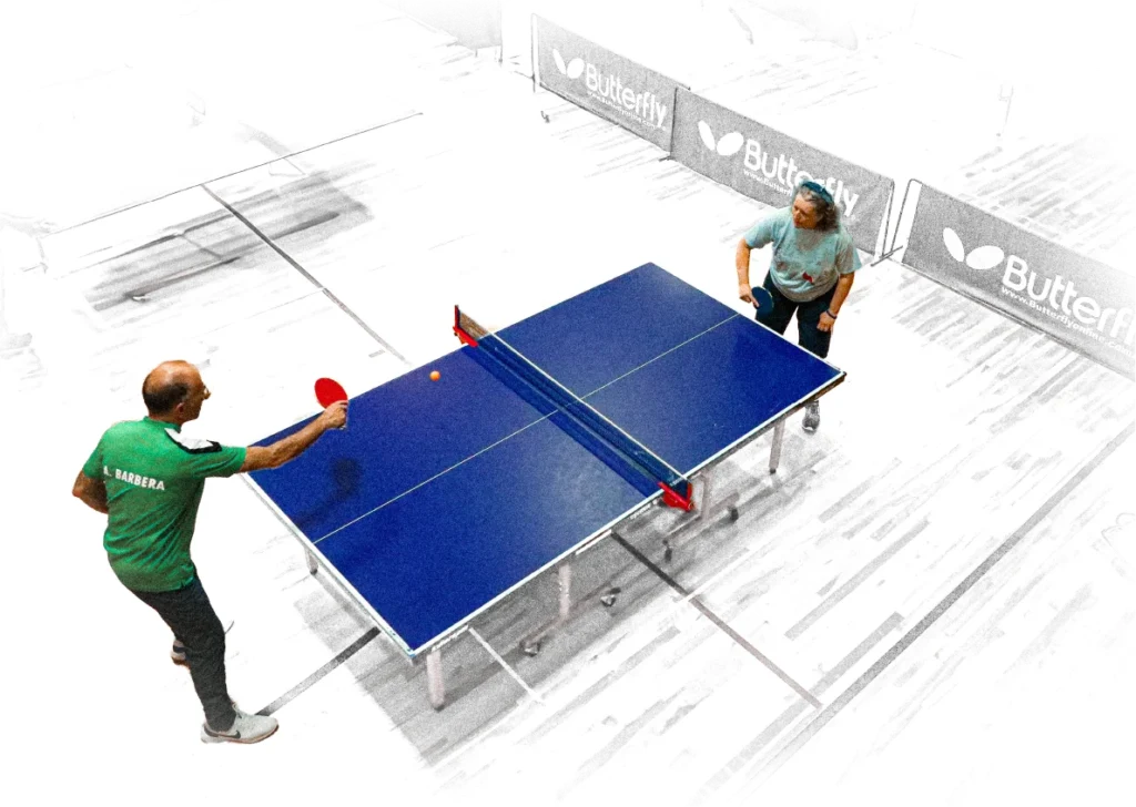 A-Barbera-playing-pingpong-with-a-woman
